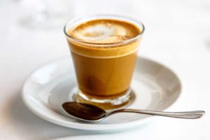 cortado spanish coffee with milk in the cup